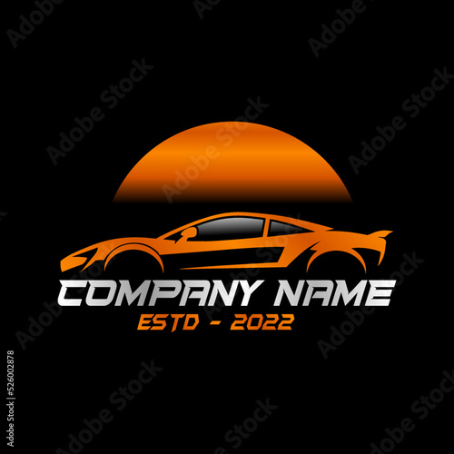 Car Logo Sign in orange and silver color with black background