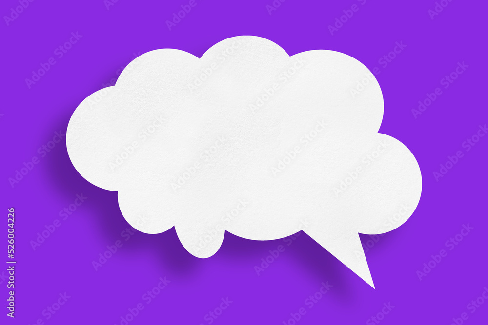 white cloud paper speech bubble shape against purple background white cloud paper speech bubble shape against purple background