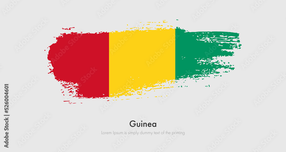 Obraz premium Brush painted grunge flag of Guinea. Abstract dry brush flag on isolated background