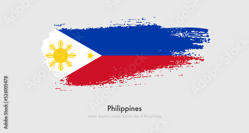 Brush painted grunge flag of Philippines. Abstract dry brush flag on isolated background