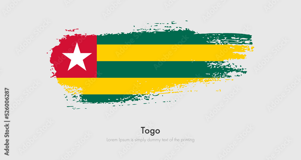 Obraz premium Brush painted grunge flag of Togo. Abstract dry brush flag on isolated background