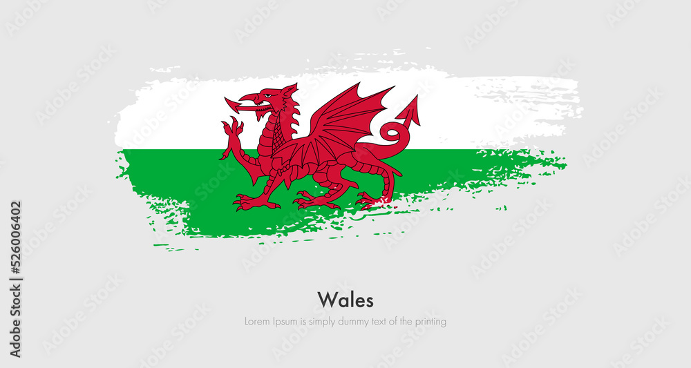 Brush painted grunge flag of Wales. Abstract dry brush flag on isolated background