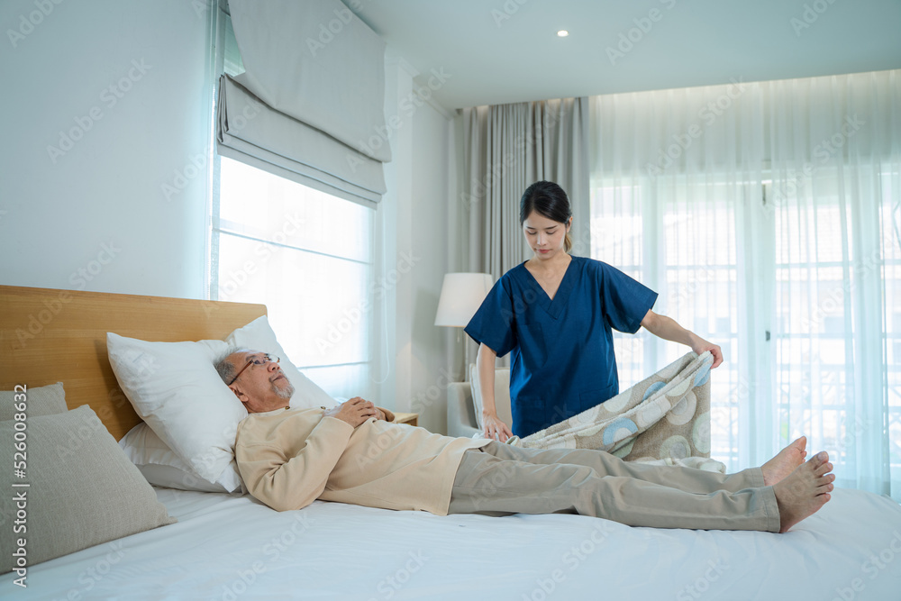 Nurses take care in patient bed in home bed in home,Home care service.