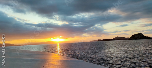 sunset over the sea, trip to komodo island photo