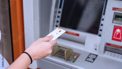 Atm money machine cash. Money bank credit card holding hand. Withdraw money cash from atm. Bank credit card, us dollar.