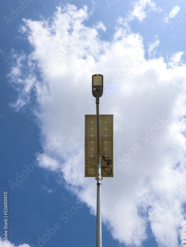 lamp post against blue sky