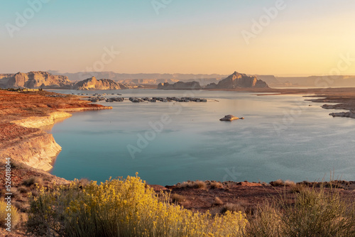 Morning sunrise over the rocky desert mountains of Lake Powell in northern Page Arizona