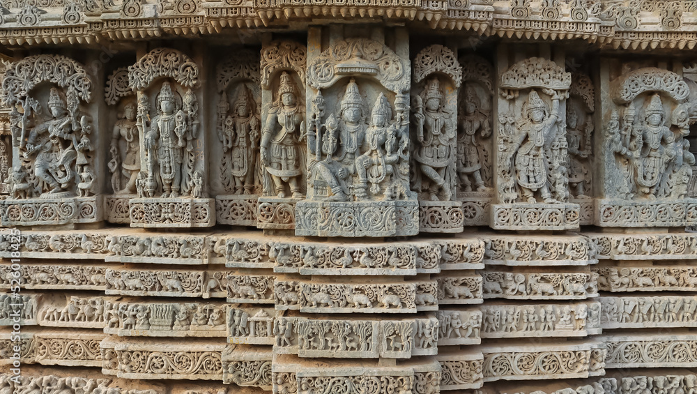 The Beautiful Carving Sculptures of Hindu God and Goddess on the Temple of Shri Lakshminarshimha Temple, Javagal, Hassan, Karnataka, India.