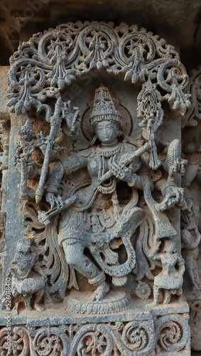 The Sculpture of Goddess Sarasvati along with Veena, Lakshminarsimha Temple, Javagal, Hassan, Karnataka, India.