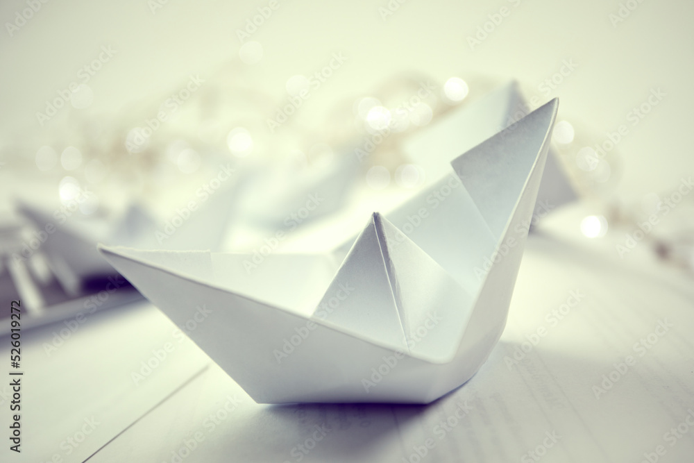 paper boats on the documents paper boats on the documents