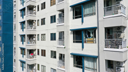 Fotografie, Obraz Exterior of a modern high-rise multi-story apartment building condo - facade, wi