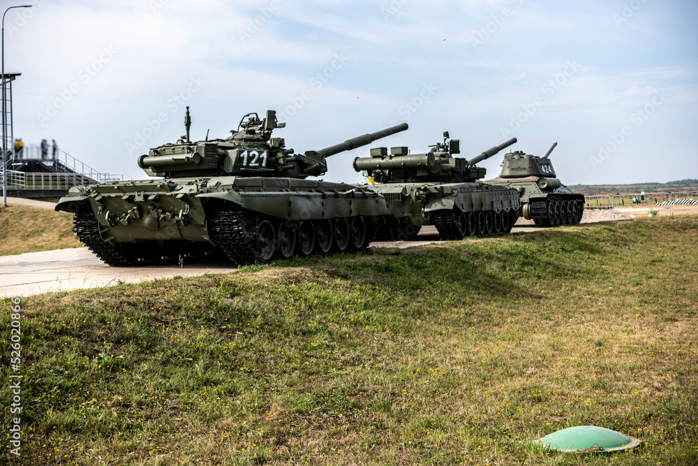demonstration of modern military equipment in the field on a sunny summer day demonstration of modern military equipment in the field on a sunny summer day