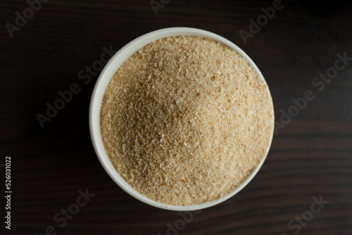  raw breadcrumbs in small white bowl