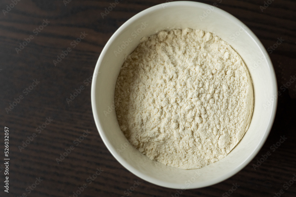 small white bowl with white flour small white bowl with white flour