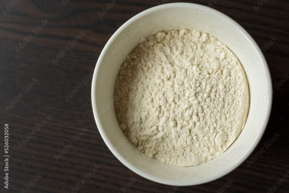 small white bowl with white flour small white bowl with white flour