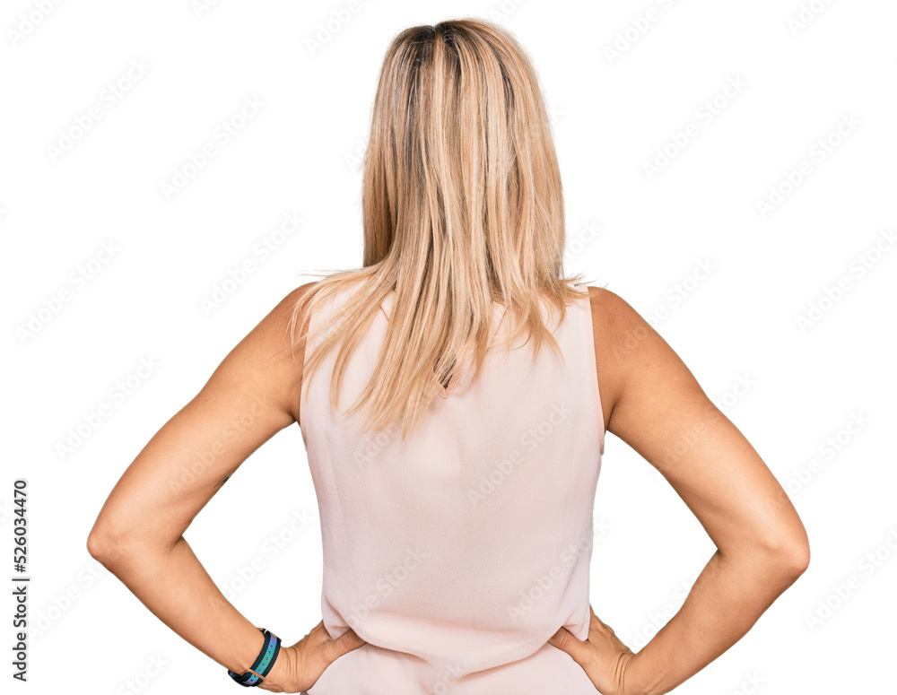 Naklejka premium Middle age caucasian woman wearing casual clothes standing backwards looking away with arms on body