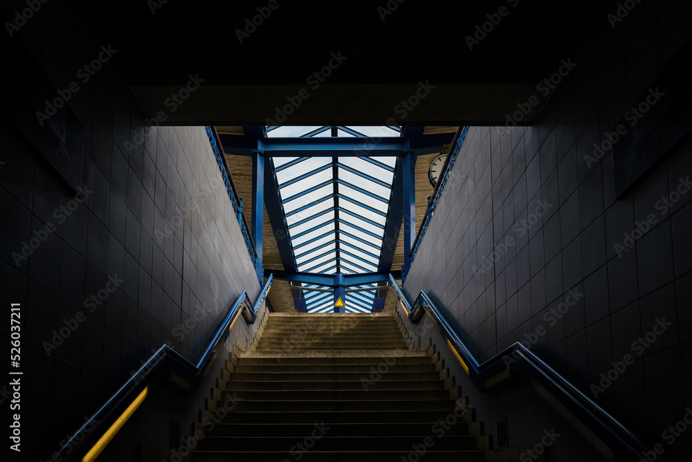 public staircase at station or mall for exit, entrance, emergency. stair inside the metro, subway with cleanly steel handrail. modern platform with granite staircase public staircase at station or mall for exit, entrance, emergency. stair inside the metro, subway with cleanly steel handrail. modern platform with granite staircase