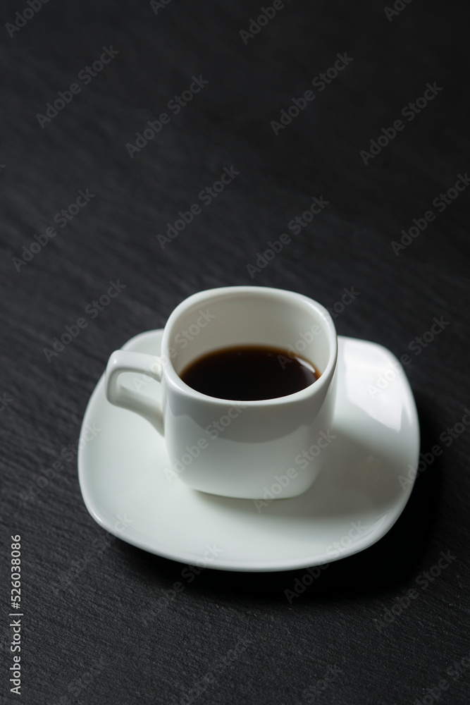 close-up shot of cup of coffee on black background