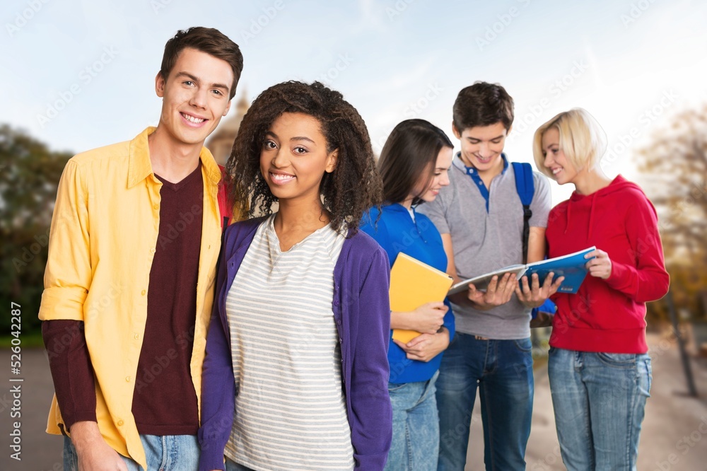 Teenager Student friends in the University Campus. Students ready to start classes concept Teenager Student friends in the University Campus. Students ready to start classes concept