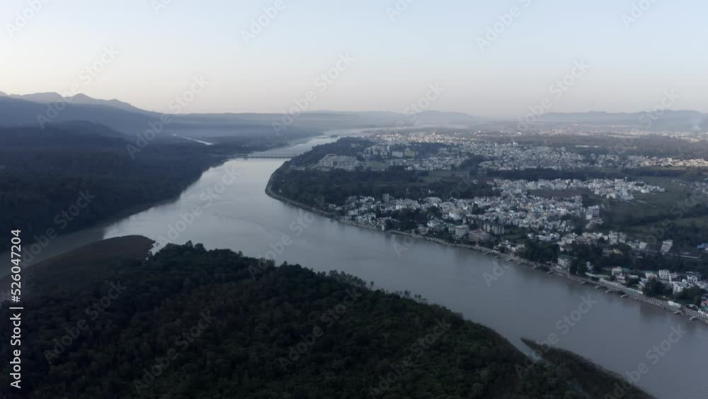 Aerial View Of Sacred Ganges River At Sunrise In Rishikesh, Uttarakhand, India. Aerial View Of Sacred Ganges River At Sunrise In Rishikesh, Uttarakhand, India.