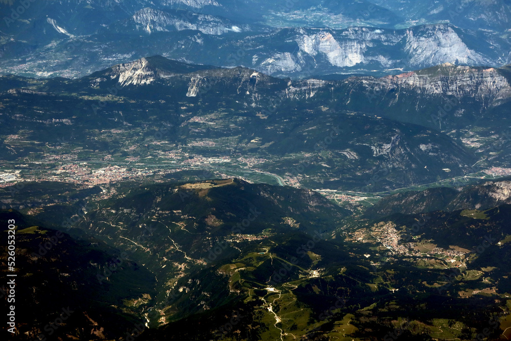 The Alps - the highest and most extensive mountain range system in Europe. Alps seen from the airplane window The Alps - the highest and most extensive mountain range system in Europe. Alps seen from the airplane window