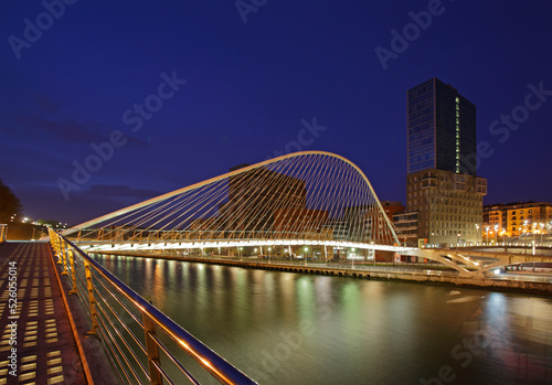 The Zubizuri footbridge (white bridge), also called the Campo Volantin Bridge, across River Nervion, Bilbao, Spain photo