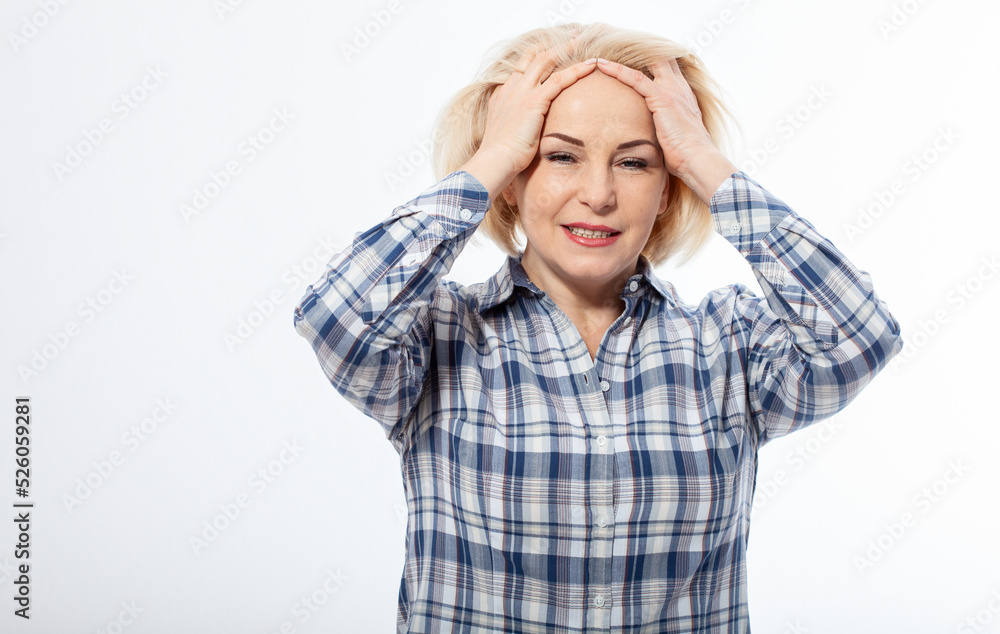 Closeup portrait of beautiful mature old senior mid aged woman suffering from headache migraine massaging temples in menopause period illness, worried Closeup portrait of beautiful mature old senior mid aged woman suffering from headache migraine massaging temples in menopause period illness, worried