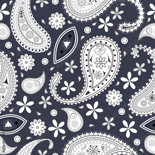Black and white paisley seamless pattern on a dark background.
