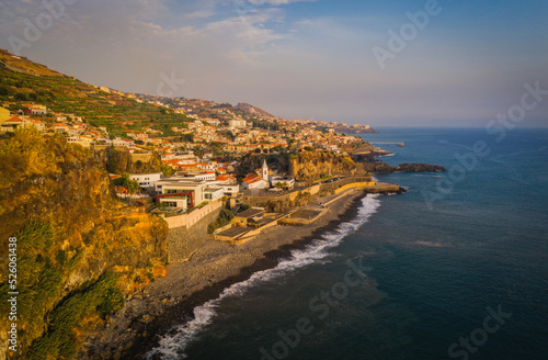 Camara de Lobos village at sunset, Madeira island, Portugal. October 2021. Aerial drone picture