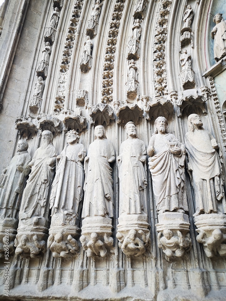 statues at the gothic gate of Huesca Cathedral Spain