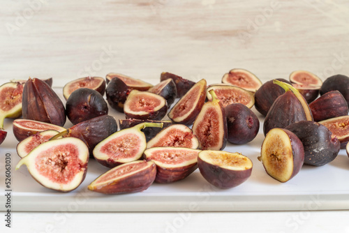 Obraz na plátně Cut up fig fruits on white background.