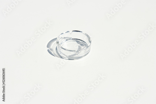 glass ashtray on white formica table