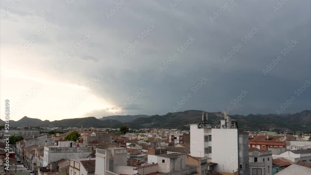 Time lapse, stormy clouds arriving to the town. Time lapse, stormy clouds arriving to the town.