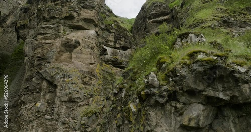 Massive Eroded Rocks At The Mountains In Tmogvi Fortress, Samtskhe-Javakheti, Southern Georgia. Aerial Close Up photo