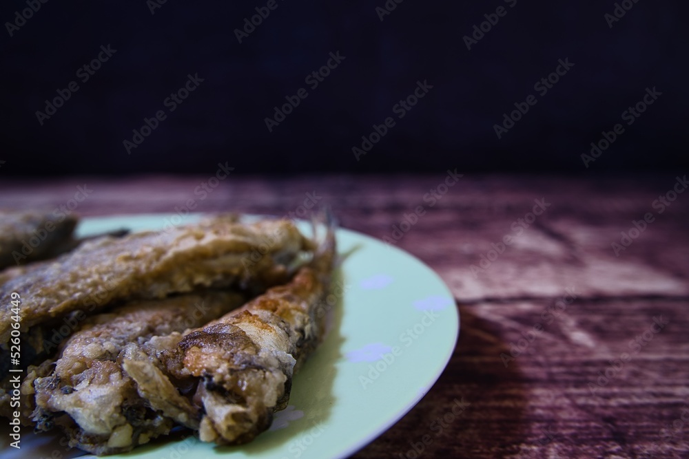 Readytoserve fried fish, world food day . Stock Photo Adobe Stock