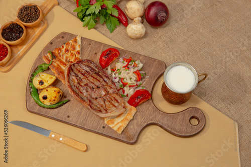 Delicious Turkish Traditional Kebab cutlet with grilled tomato on white plate stock photo
Above, Angle, Animal, Barbecue - Meal, Beef