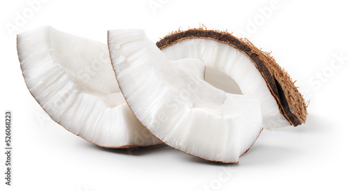 Coconut piece isolated. Coconut slice on white background. Broken white coco pieces with clipping path. Full depth of field.
