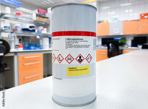 Metal can containing a very dangerous and harmful chemical agent that cause long-lasting health effects. Appropriate safety pictograms are present on the label. photo