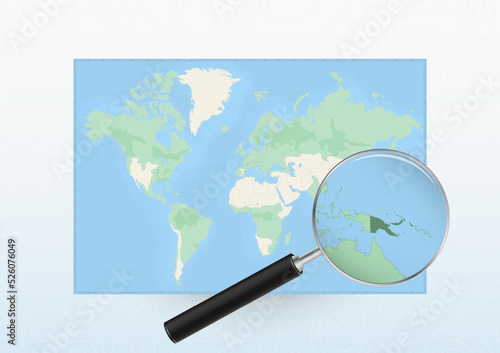 Map of the World with a magnifying glass aimed at Papua New Guinea  searching Papua New Guinea with loupe.