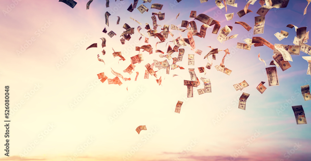 Money falling from sky - one hundred US dollar bills.