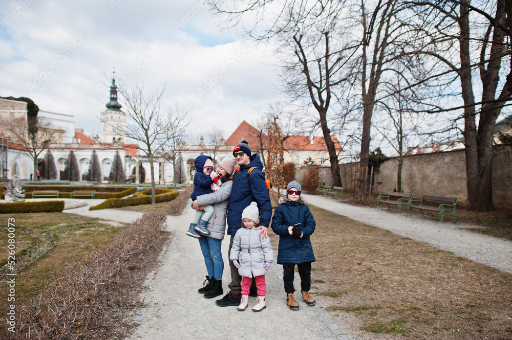 Obraz premium Family walking at historical Mikulov Castle, Moravia, Czech Republic. Old European town.