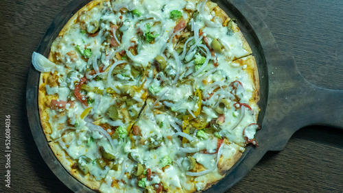 Vegetarian pizza in india. Indian Cheese Veg pizza.