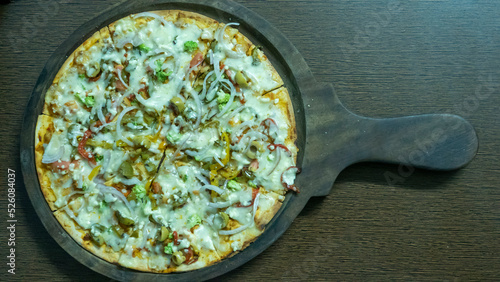 Vegetarian pizza in india. Indian Cheese Veg pizza.