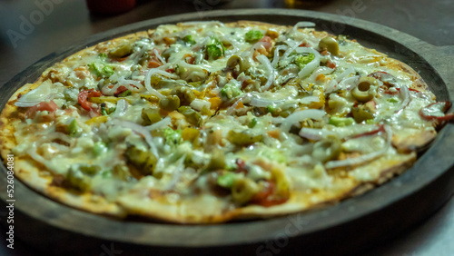 Vegetarian pizza in india. Indian Cheese Veg pizza.