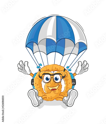 Fototapeta Naklejka Na Ścianę i Meble -  pretzel skydiving character. cartoon mascot vector