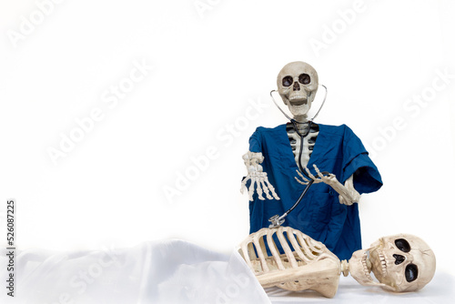 Skeleton doctor wearing blue scrubs uses stethoscope to examine patient lying on hospital bed with shocked and horror look on face after dying waiting for medical care