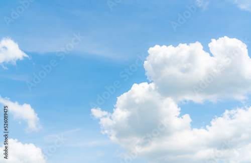 Beautiful blue sky and white cumulus clouds abstract background. Cloudscape background. Blue sky and fluffy white clouds on sunny day. Nature weather. Beautiful blue sky for happy day background.
