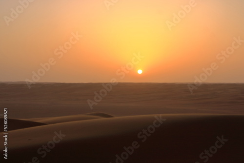 sunset in the desert Wahiba Sands in Oman