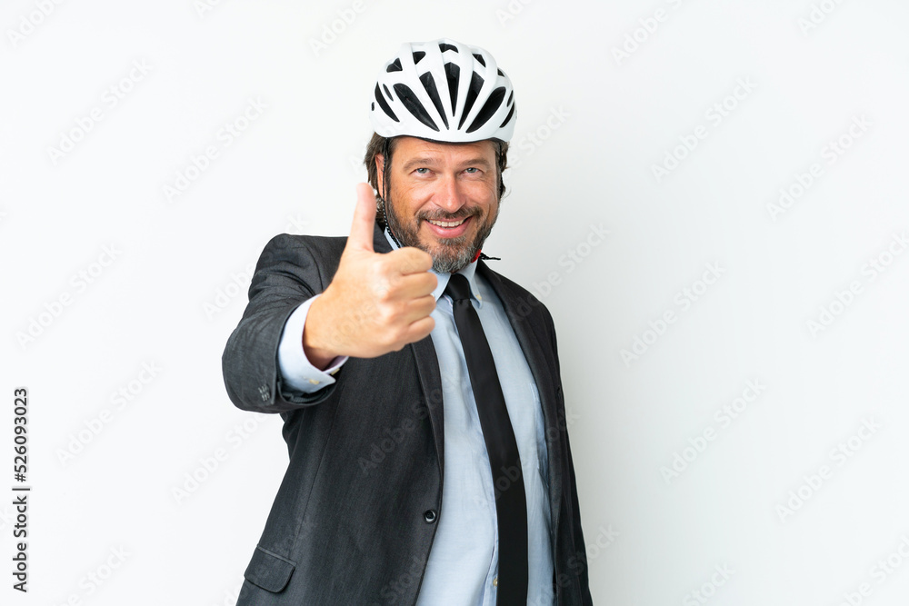 Business senior man with a bike helmet isolated on white background with thumbs up because something good has happened Business senior man with a bike helmet isolated on white background with thumbs up because something good has happened