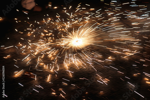Golden Firework sparkles on black background. Happy Festivals